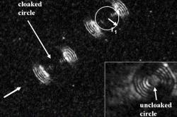 The cloak's concentric gold rings can steer light waves travelling along a surface around an object and straight on again as if it was not there (Image: Smolyaninov/University of Maryland)